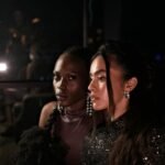 celebrity style inspiration - Elegant women in fashionable attire captured at a chic evening event.
