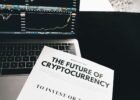 how to invest in crypto - A detailed look at cryptocurrency market trends using a laptop and analytical document.