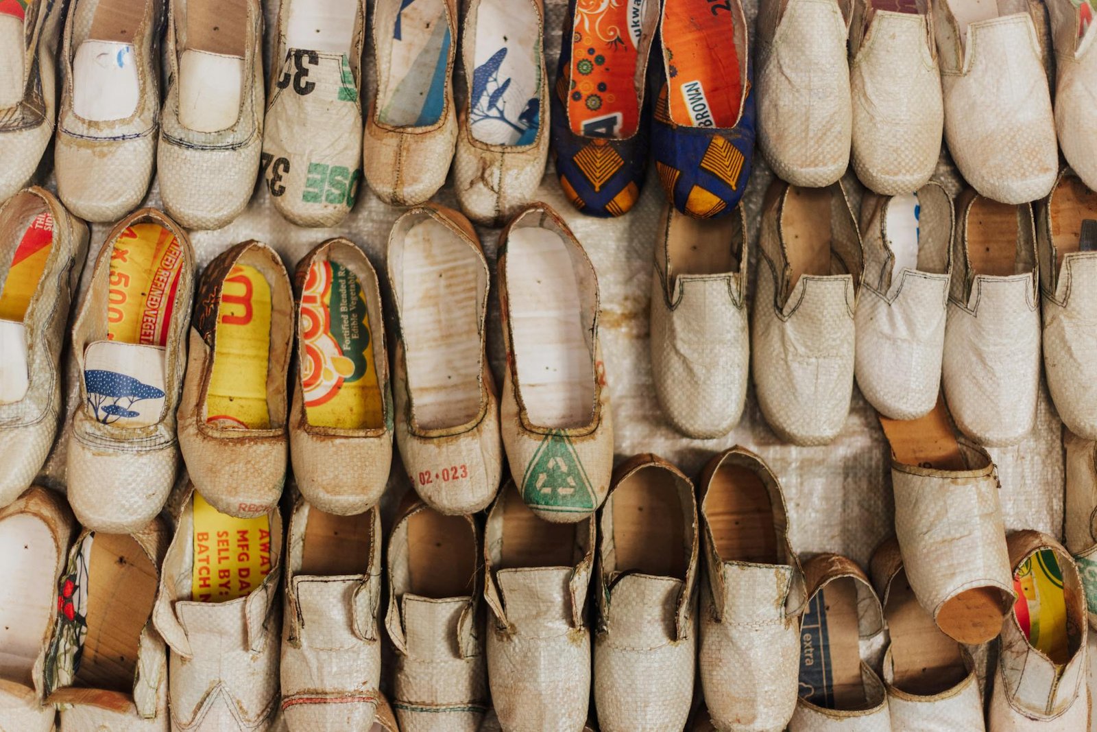 what is sustainable fashion - Handmade slip-on shoes crafted from recycled materials, showcasing sustainable fashion in Uganda.